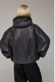 Short sheepskin coat with a hood made of natural sheepskin in graphite color